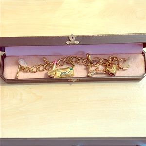 Juicy Couture bracelet with only reindeer charm.
